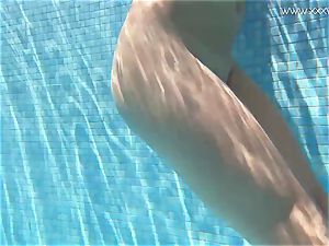 Jessica Lincoln petite inked Russian nubile in the pool